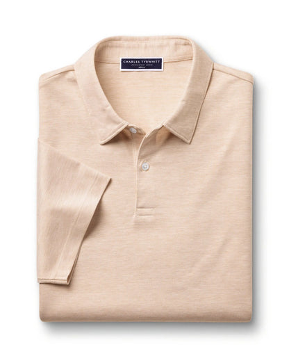 Charles Tyrwhitt polo shirt folded flat, light tan with button placket