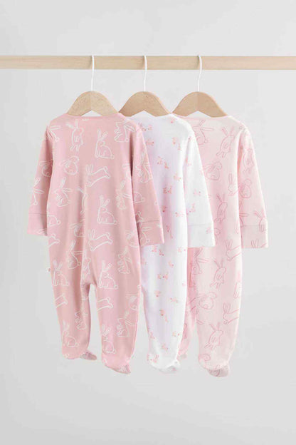 Front-view hooded footed onesie pajamas in pink and white, animal-print all over
