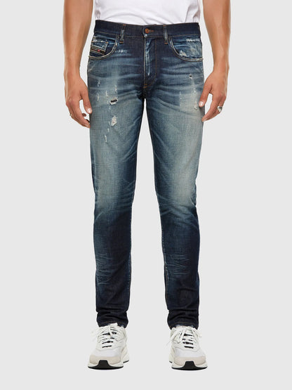 Men's blue distressed jeans with five-pocket design and belt loops