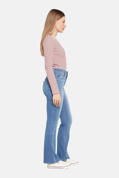 Med indigo denim jeans, slight flare straight leg, five-pocket styling