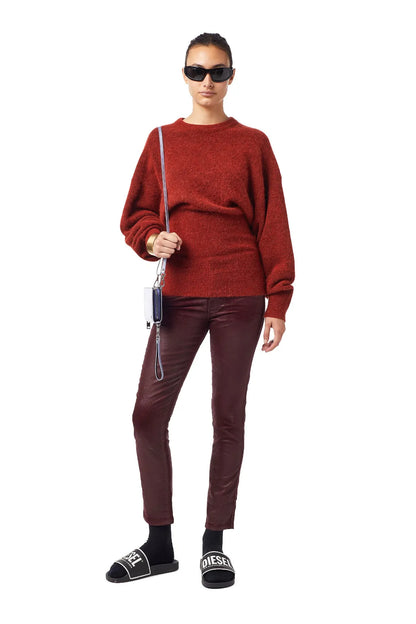Red knit crewneck sweater with balloon sleeves and ribbed cuffs, full-length