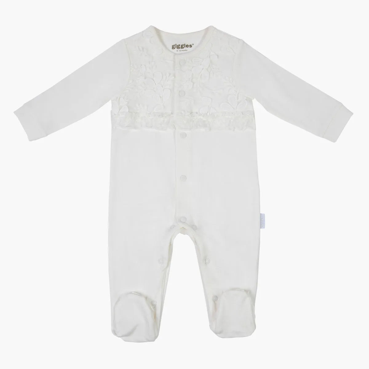 Cream baby romper with long sleeves and feet, textured floral yoke, giggles® logo