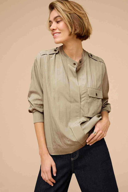 Khaki green utility jacket with flap chest pocket and button cuffs