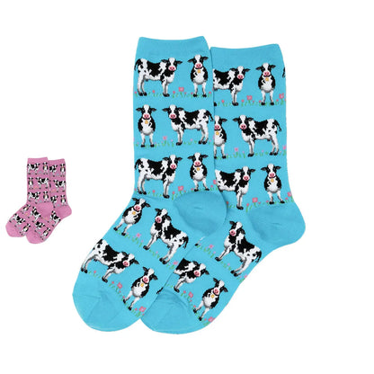 Turquoise crew socks with black-and-white dog pattern and pink accents, ribbed cuffs