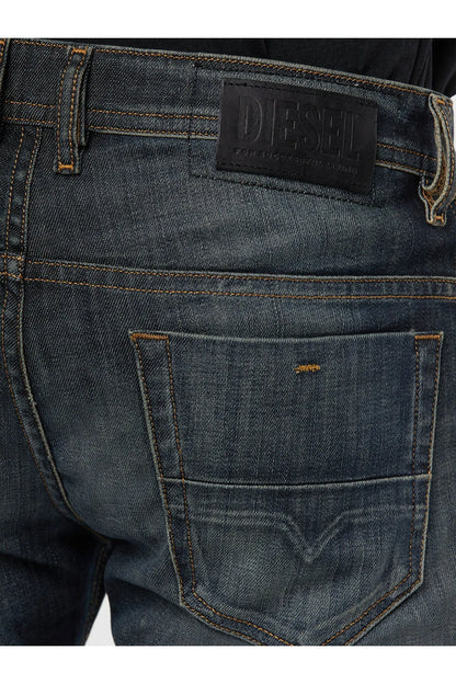 Dark blue denim jeans with "Diesel" leather patch and front coin pocket