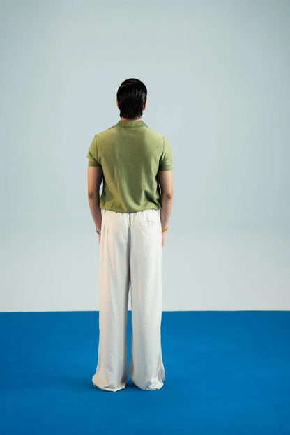 Olive polo shirt back view with short sleeves and textured knit fabric