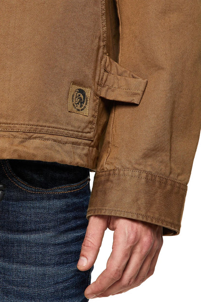Light brown Diesel jacket sleeve with logo patch and button cuff