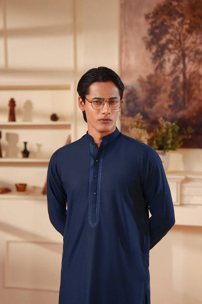 Men's dark navy kurta with button placket and embroidered front yoke