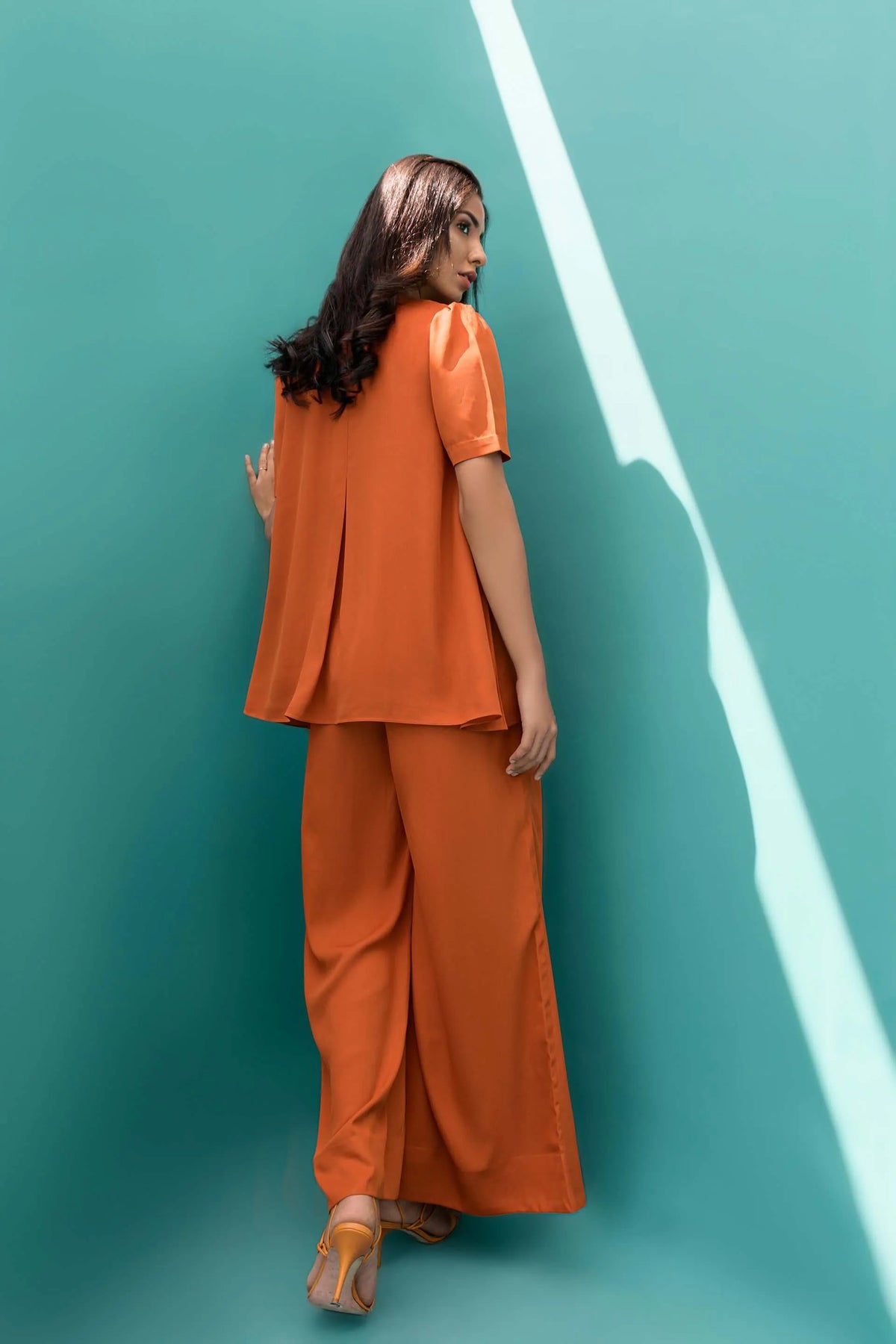 Orange velour tunic and wide-leg pants, back view with short sleeves