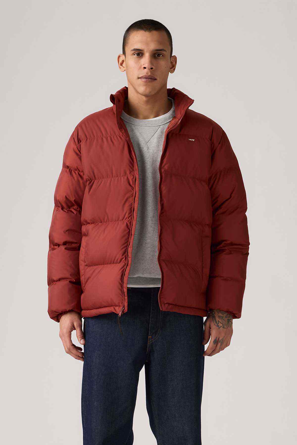 Red padded puffer jacket with zip front and stand collar