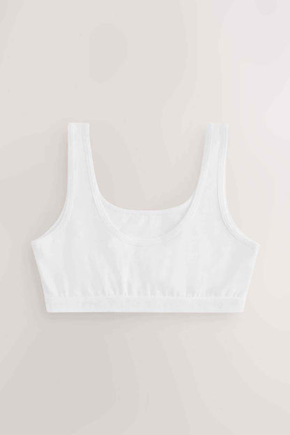White crop bra with wide straps and smooth underband elastic, front view