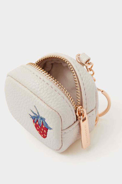 Cream fabric zip pouch keychain with embroidered strawberry and rose-gold zipper