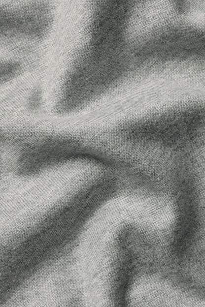 Grey knit T-shirt fabric close-up texture