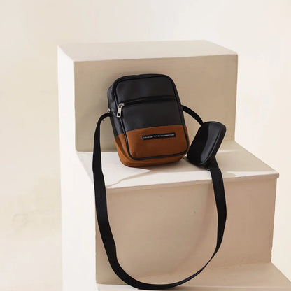 Two-tone crossbody bag with zip top and detachable mini pouch, black and tan