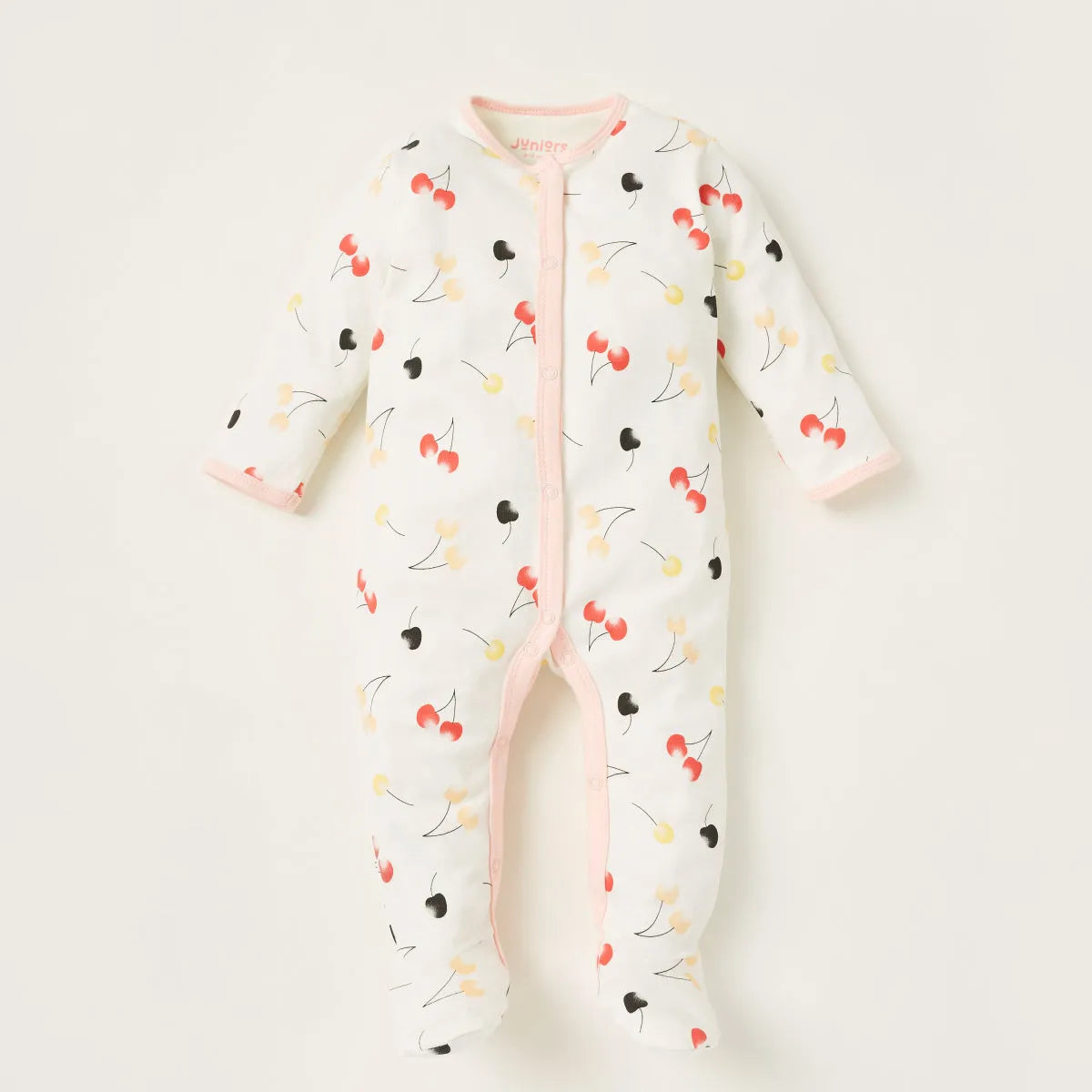 White baby footie with full front zipper, multicolor cherry and heart print