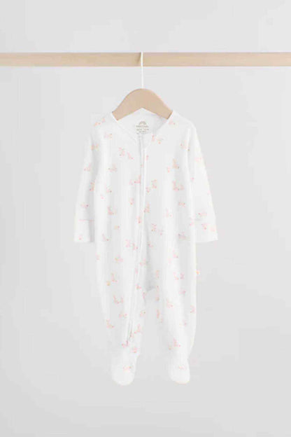 White hooded footed onesie pajamas with all-over animal print and button front