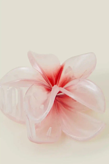 Pink flower hair clip with layered translucent petals and red center
