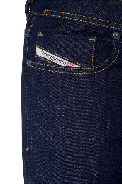 Dark blue denim jeans front pocket with stitched logo patch label