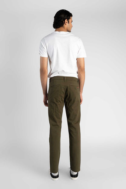 Men's olive straight-leg pants, back view, cuffed hem