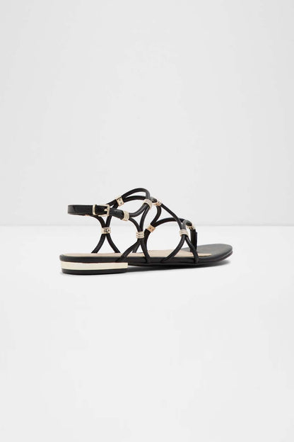 Black flat sandal with multiple crisscross straps and open toe
