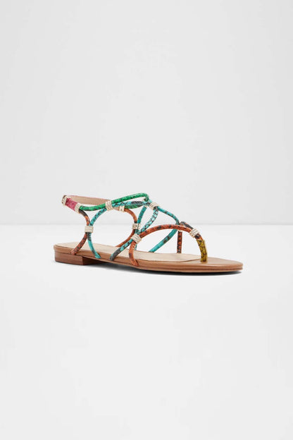 Bright multi-color thong-style flat sandals with patterned upper straps