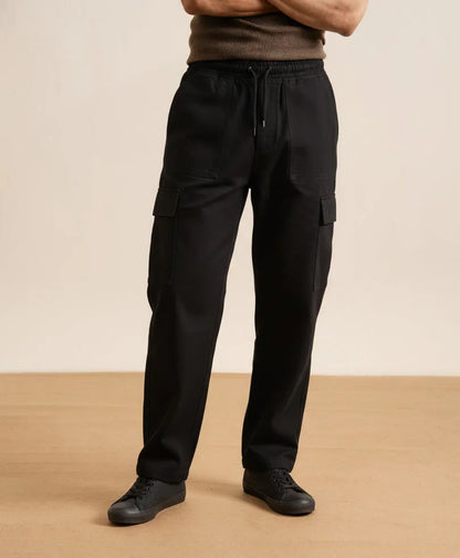 Fitted black cargo pants with drawstring waist and side cargo pockets