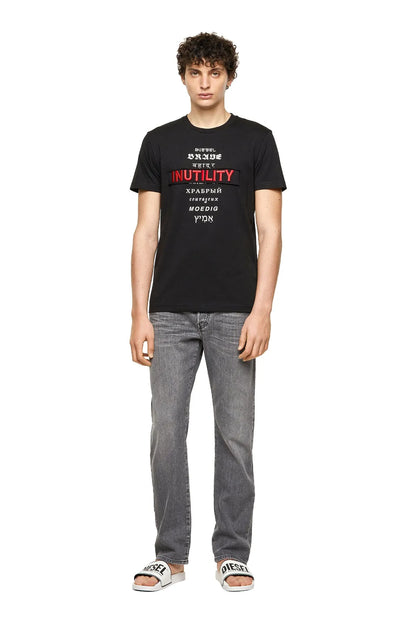 Black graphic T-shirt front view with red INUTILITy stripe print