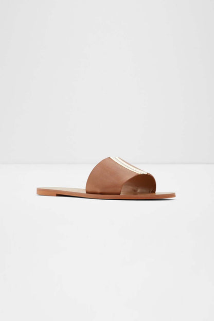 Brown slide sandal with gold striped toe-strap detail and flat sole
