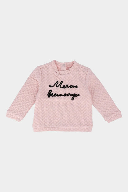 Pink textured long-sleeve baby top with black script logo and button neckline