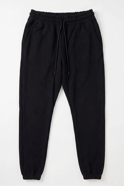 Black jogger pants with front pocket and drawstring waist