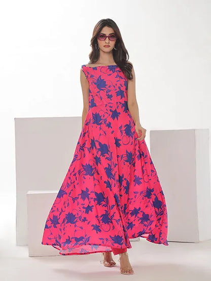 Floral sleeveless maxi dress, pink with dark blue print, round neckline and flared skirt
