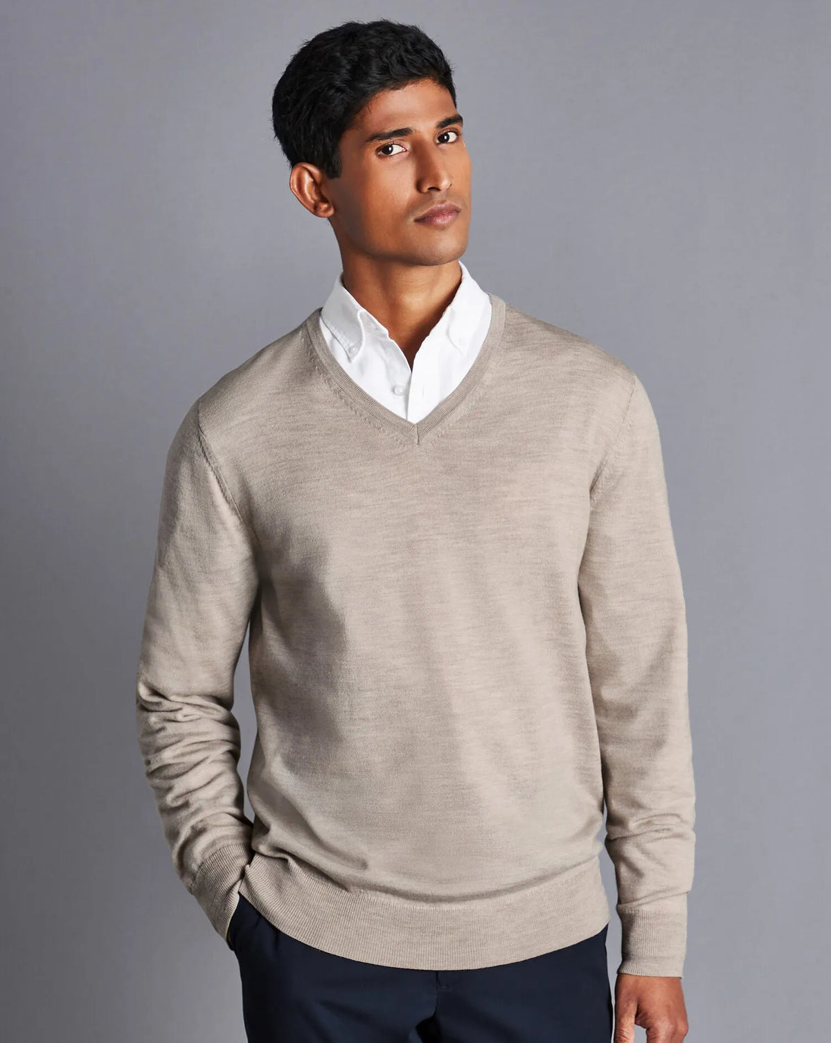 Men's beige V-neck knit sweater, long sleeve side view