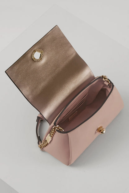 Pink flap shoulder bag with open interior view and gold chain strap