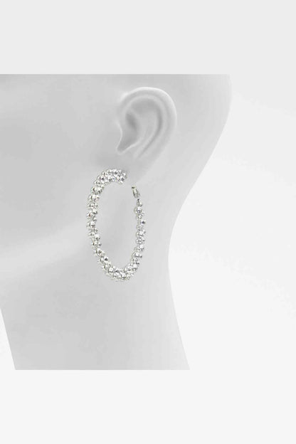 Silver-tone rhinestone open-loop earring with clear stones, close-up