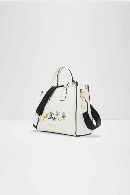 ALDO white tote bag with cartoon characters, black crossbody strap and front pocket