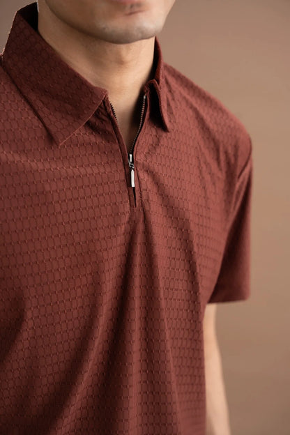 Maroon textured quarter-zip polo shirt close-up with metal zipper