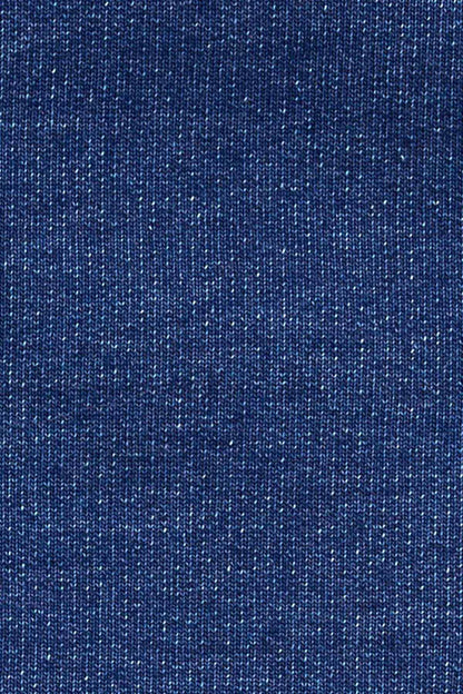 Blue speckled denim fabric texture close-up