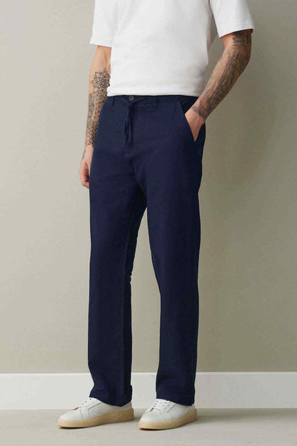 Navy straight-leg trousers with belt loops and front button closure