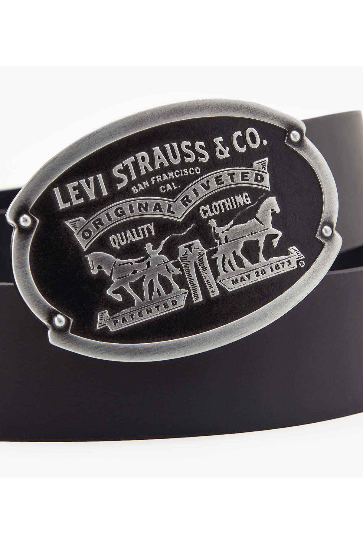 Levi's oval metal belt buckle on a dark belt strap