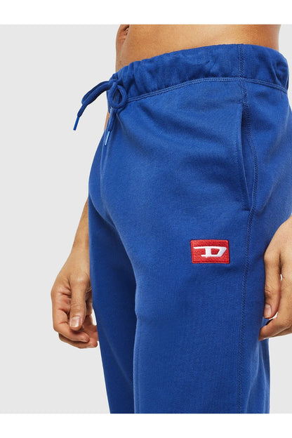 Diesel blue jogger pants from back with elastic waistband and small red logo patch