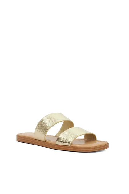 Gold metallic two-strap slide sandal on wood-toned sole