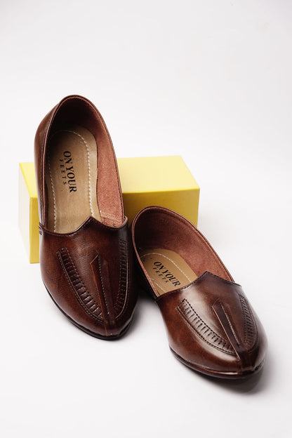 Brown leather slip-on loafers with stitched seam detailing