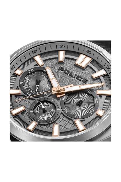Close-up of black dial chronograph with orange hour markers and multiple subdials