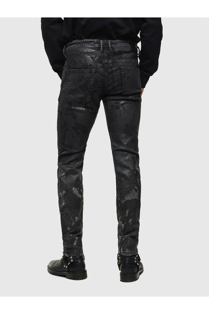 Black distressed jeans front view with five-pocket styling and slim tapered leg