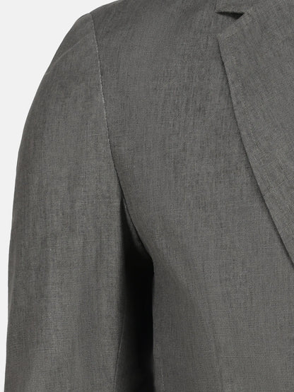 Gray blazer chest and shoulder seam detail with smooth drape