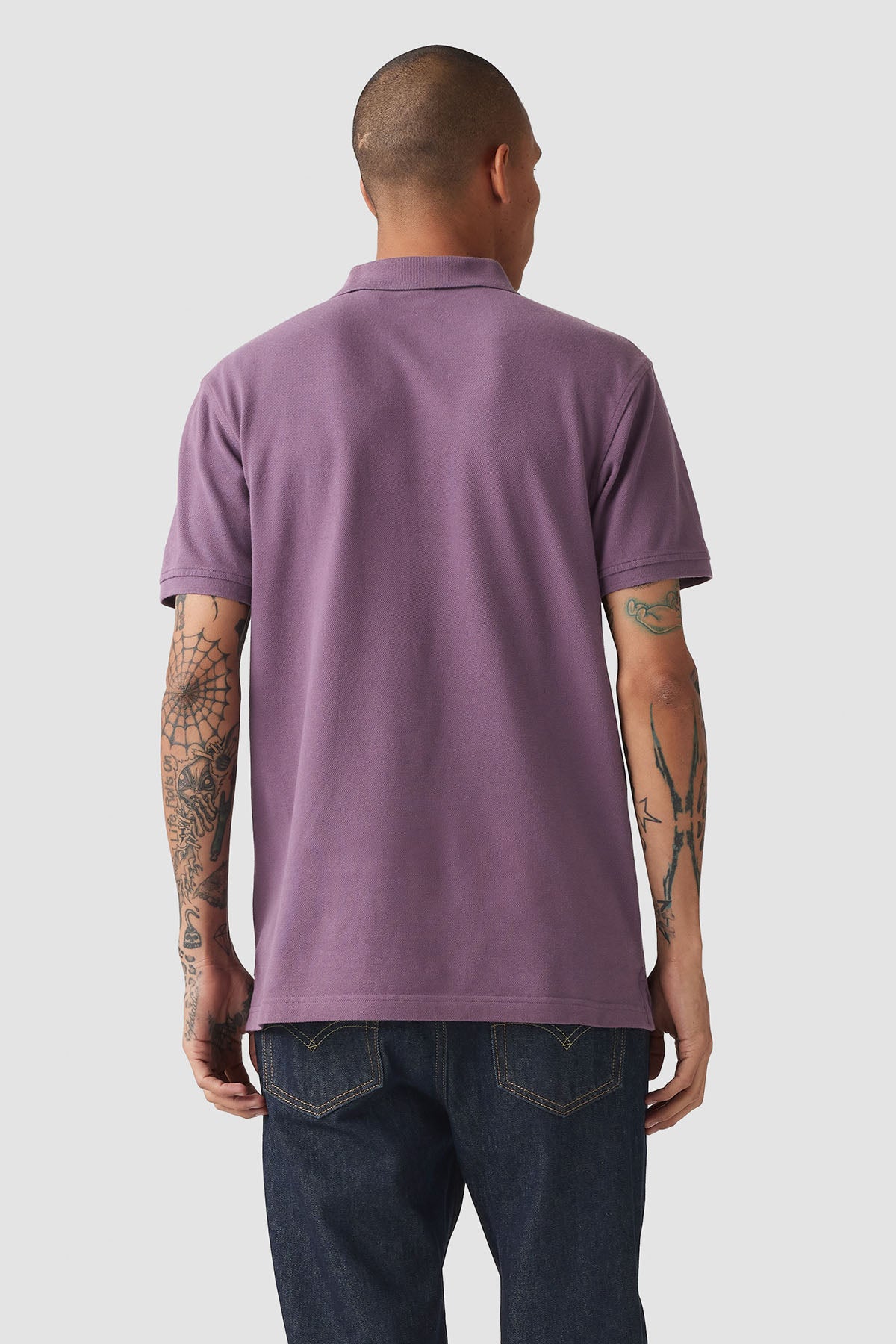 Levi's men's purple polo shirt back view with short sleeves and straight hem