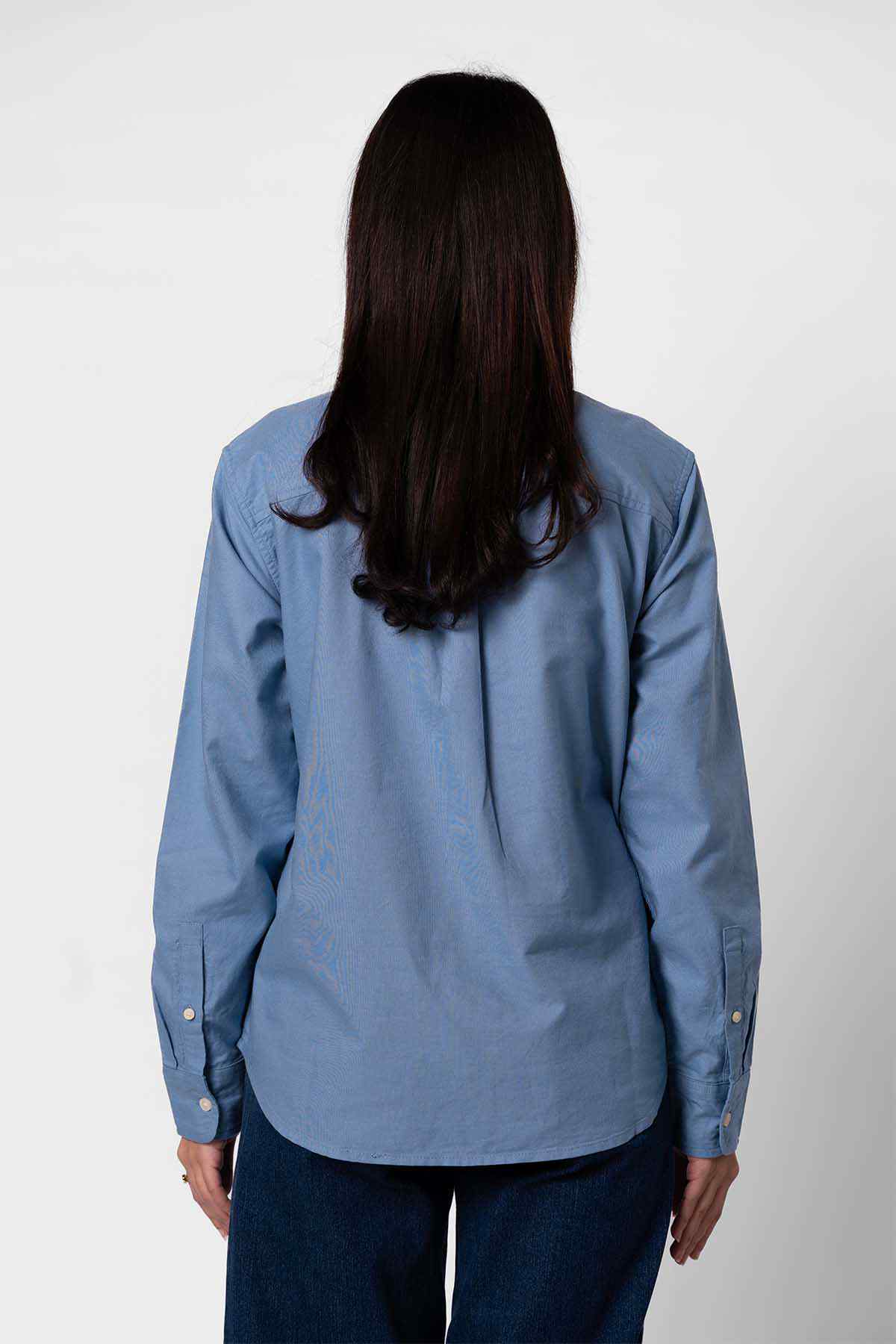 Levi's blue button-up shirt, back view with button placket and long sleeves