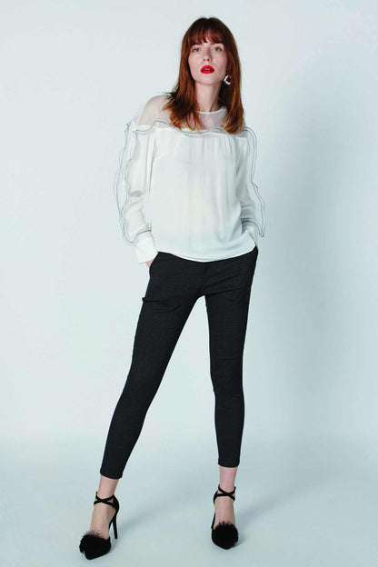 White long-sleeve sheer blouse with ruffled sleeves and scoop neck