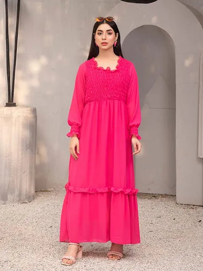 Nazmina tiered maxi dress in hot pink, smocked bodice, long sleeves, ruffle hem