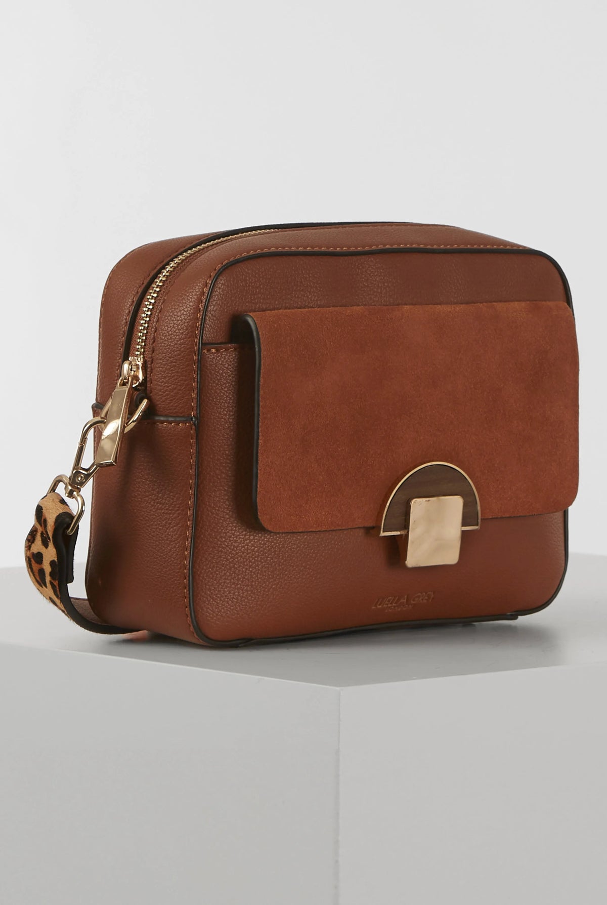 Brown leather crossbody bag with flap, silver turn-lock, gold zipper and chain strap